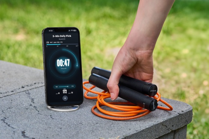 RAYNOLSE app beside jump rope handles
