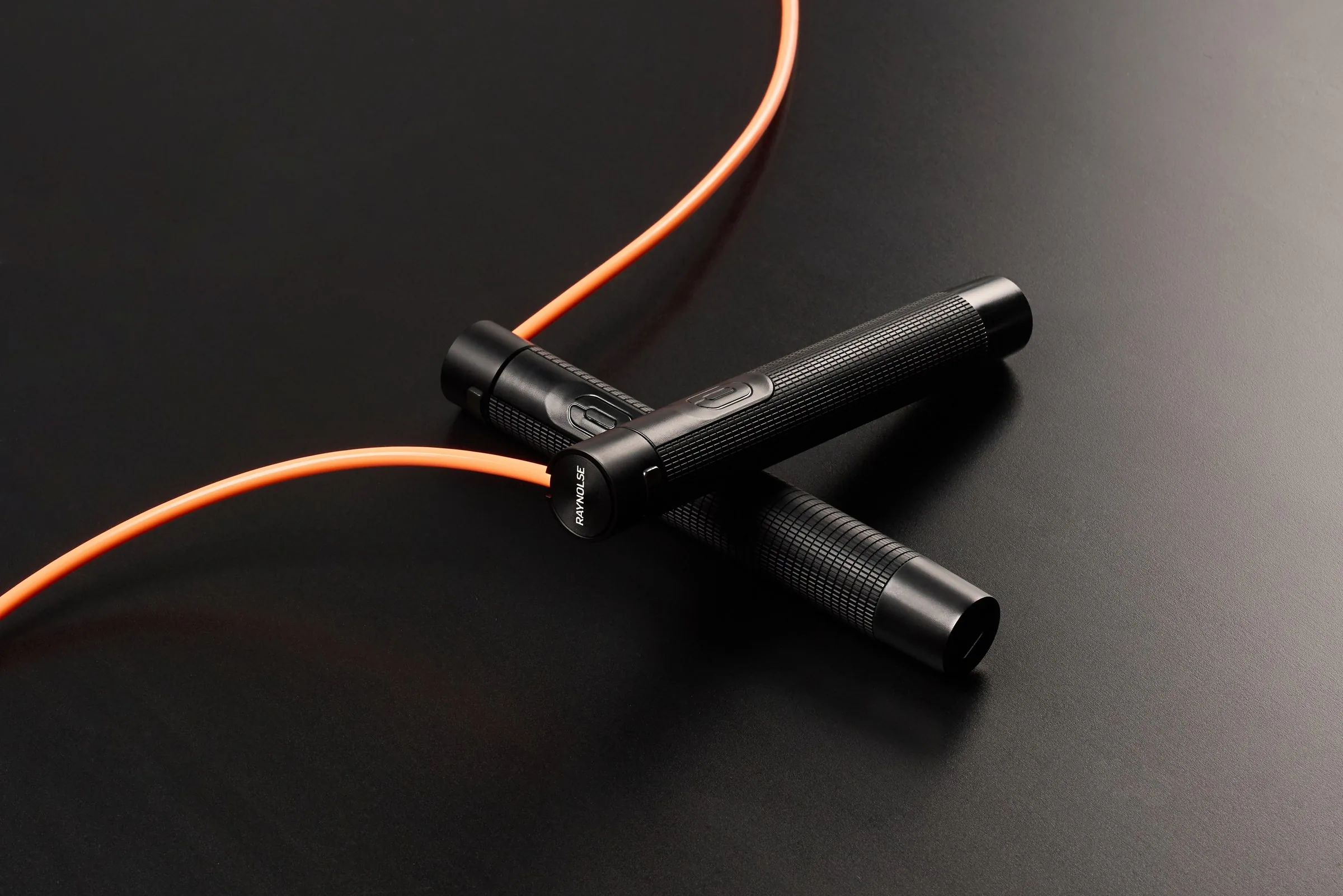 RAYNOLSE jump rope handles with orange rope